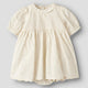 Lil' Atelier baby jurk kokosmelk NBFFLORES