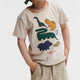 Liewood T-shirt voor jongen Apia Plaatsing Dinosaurussen / Sandy