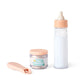 Tiny Harlow Tiny Tummies poppenvoedingset kom en lepel en melkfles